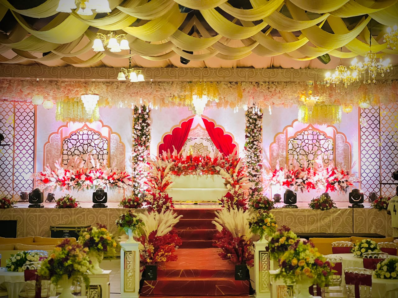 Luxury Wedding Reception decorated in gold and candlelight